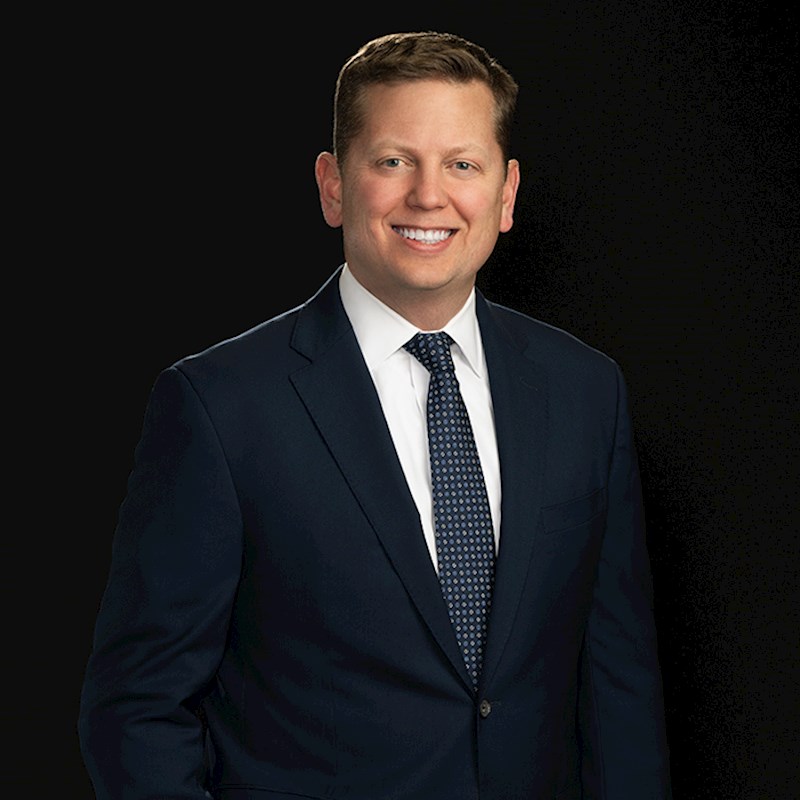 headshot of Brendan Hughes