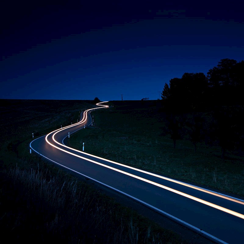 A road lit up at night