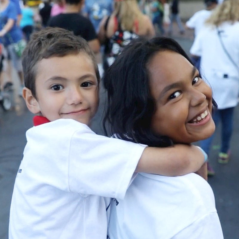 Sister and brother at theme park